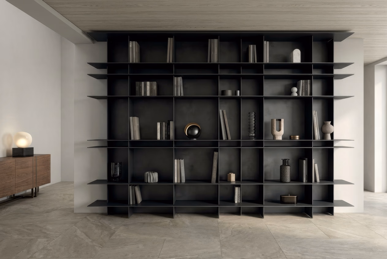 Black shelving unit with ceramic pieces and books