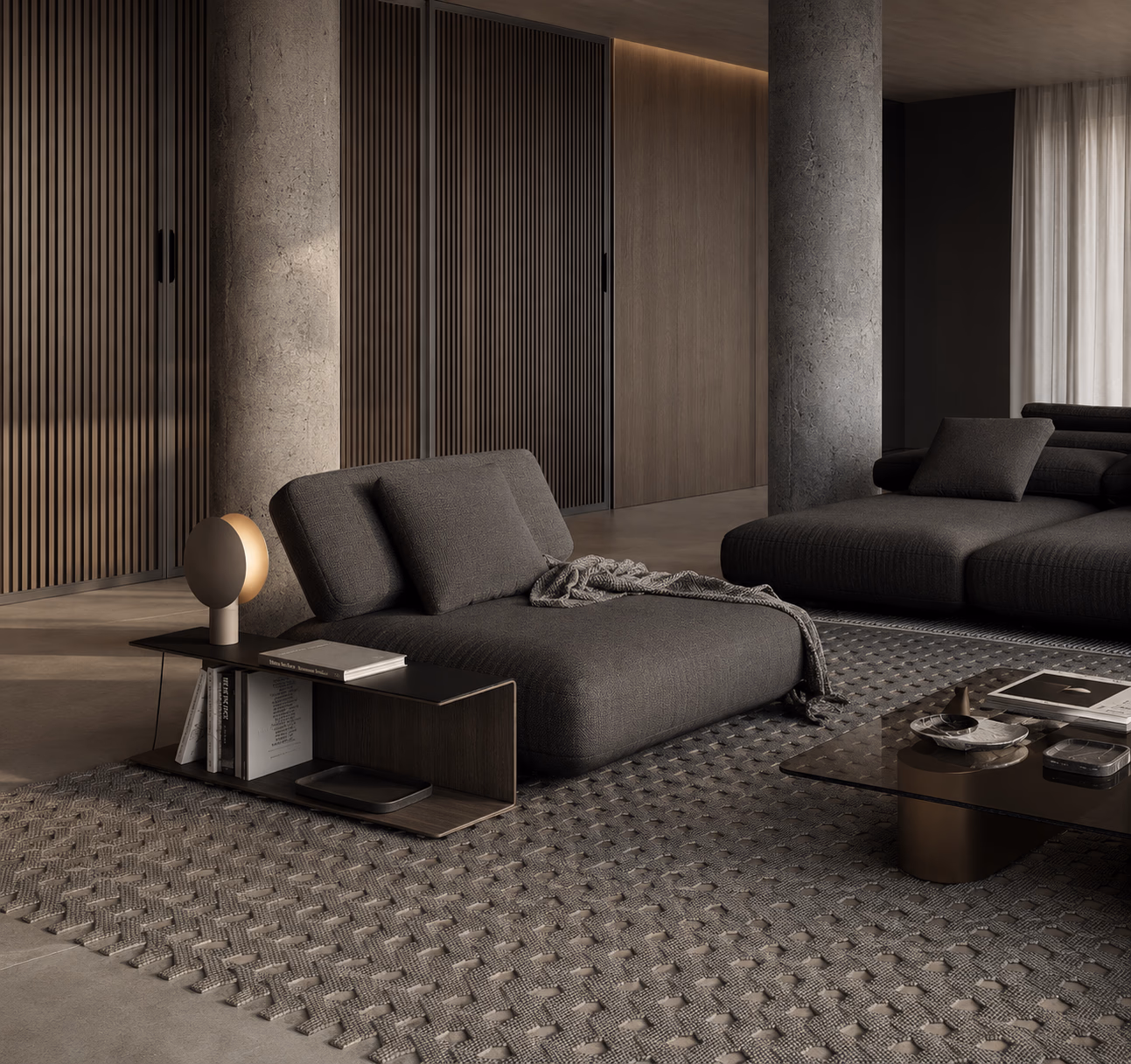 Living room with a dark chaise longue, a textured rug and wood panelling